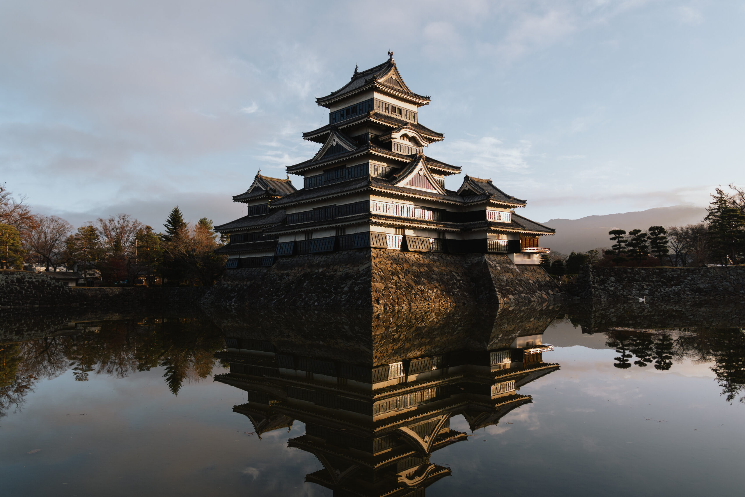 Matsumoto Castle reflected in the surrounding moat, Nagano Prefecture Japan