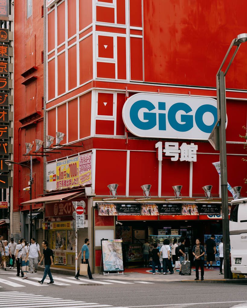 Street-level view of the GiGO arcade building entrance in Akihabara
