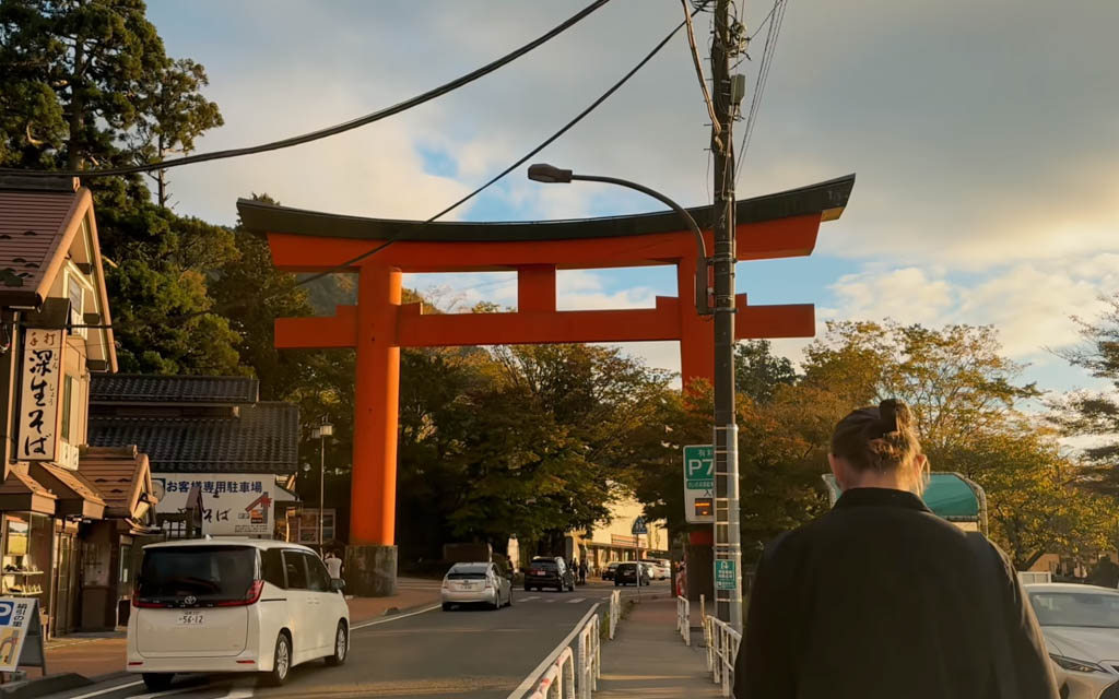 The large torii gate marking the entrance to Hakone Shrine from the main street