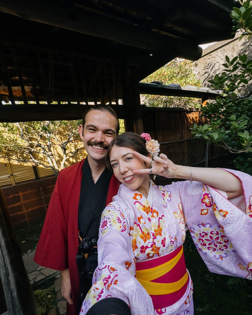 Couple taking a selfie in traditional kimono after a tea ceremony experience in Kyoto