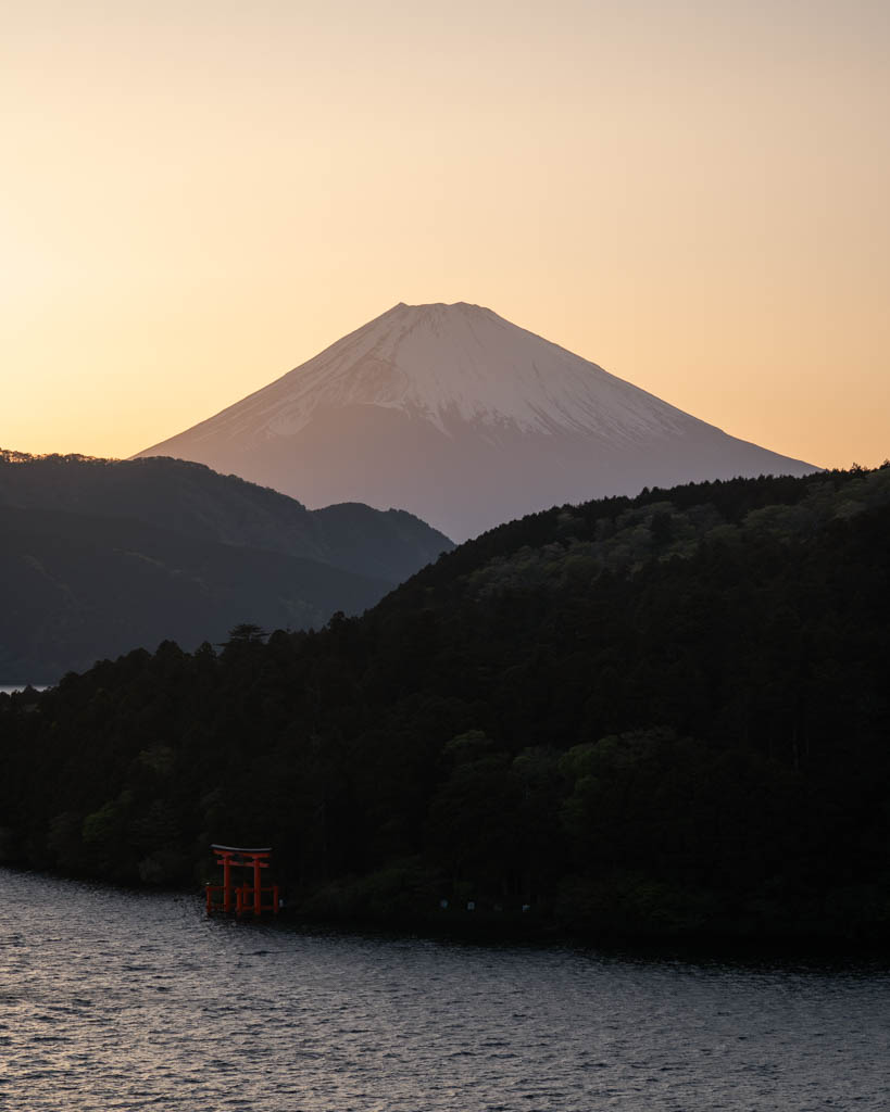 Mount Fuji at sunset seen from a quiet viewpoint above Lake Ashi