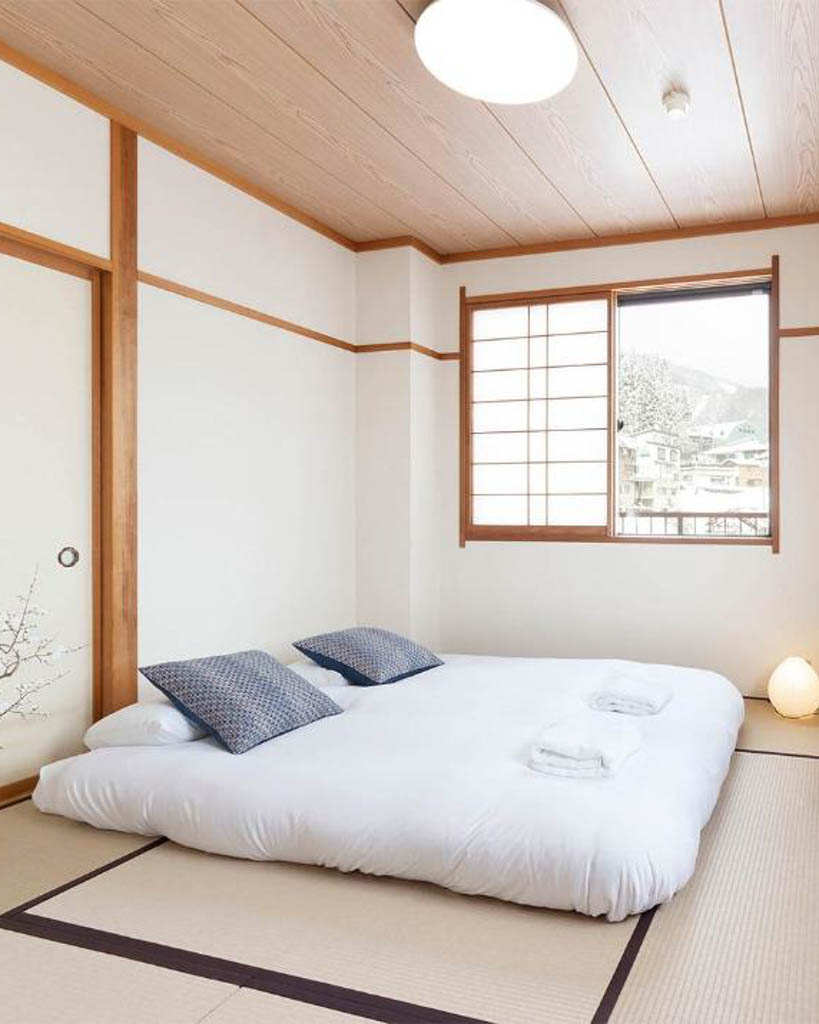 Nozawa Peaks tatami room with futon bed and mountain view